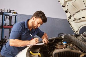 A Man Doing Pre Purchase Car Inspection in Melbourne