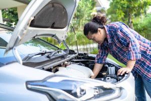 A Man Inspecting Under The Bonnet Before Buy A Used Car - Pre Purchase Car Inspection Tips